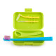 Orthodontic set for care of braces with a tongue scraper, light green